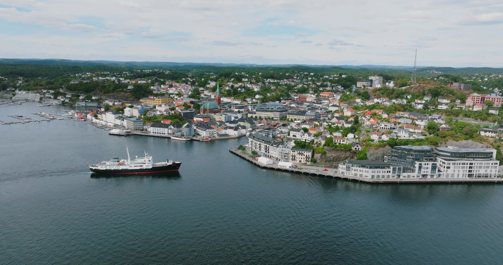 Black-hulled coastal steamer leaving the harbour, Arendal, Norway