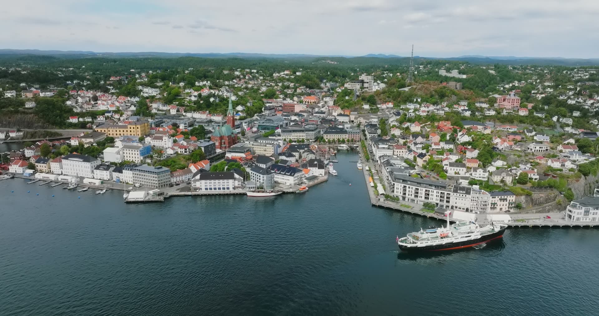 White coastal steamer moored at the quay, Arendal, Norway