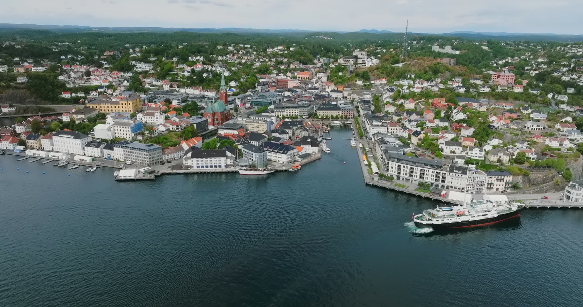 Coastal steamer at the quay by the church, Arendal, Norway