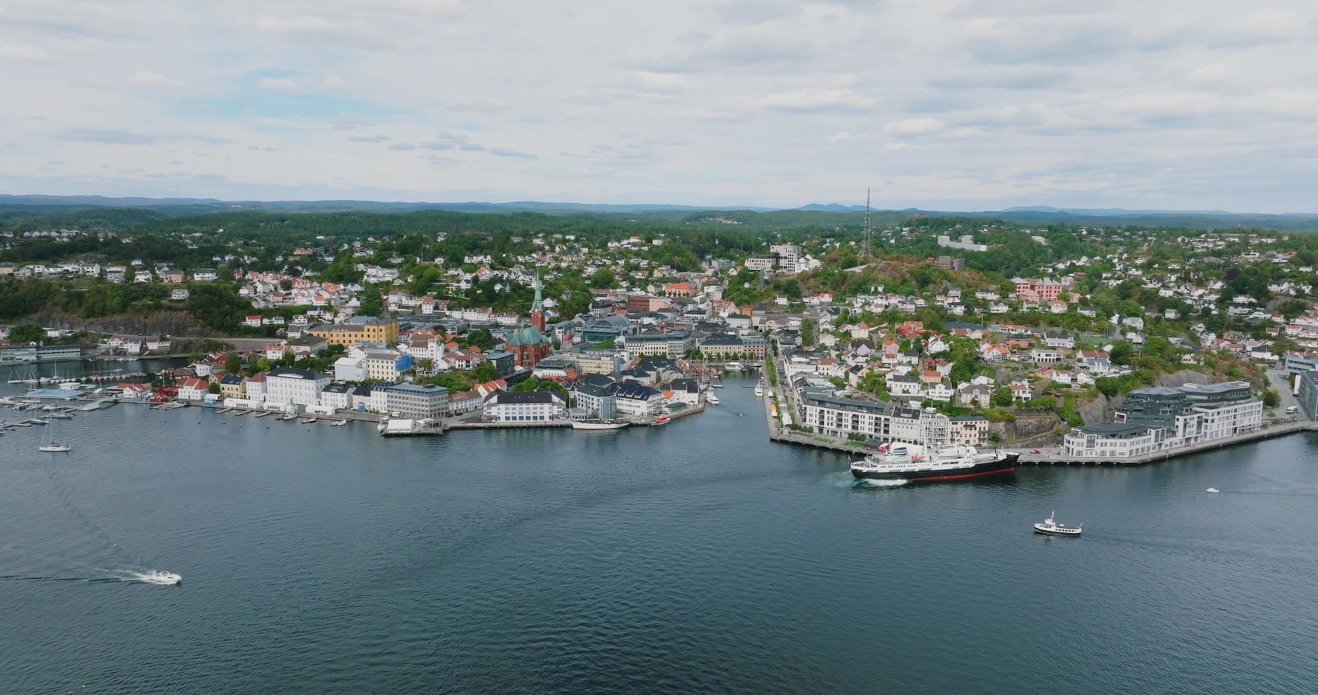 Ship moored at Tyholmen quay and marina, Arendal, Norway