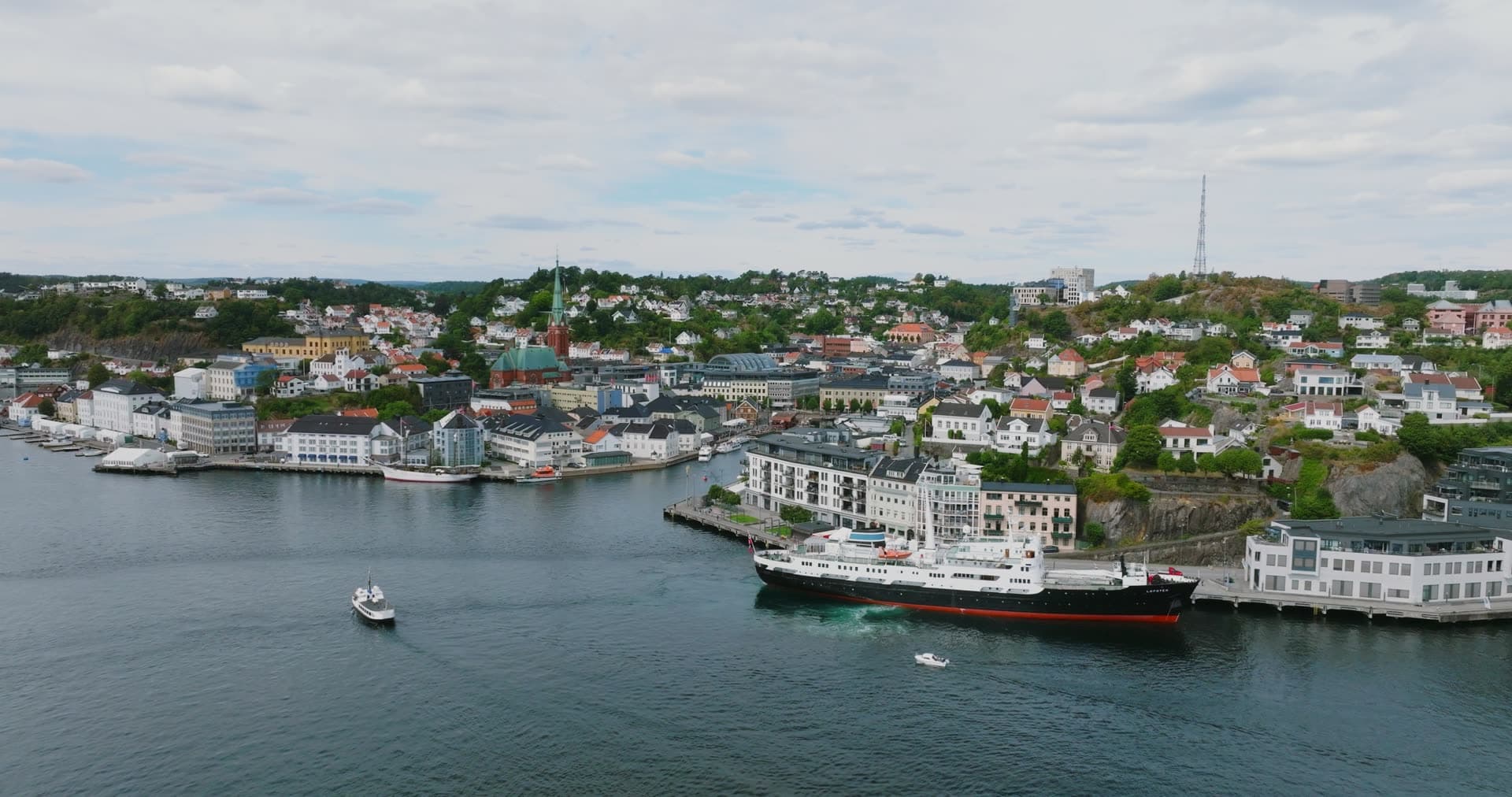 Classic steamship departing the town quay, Arendal, Norway