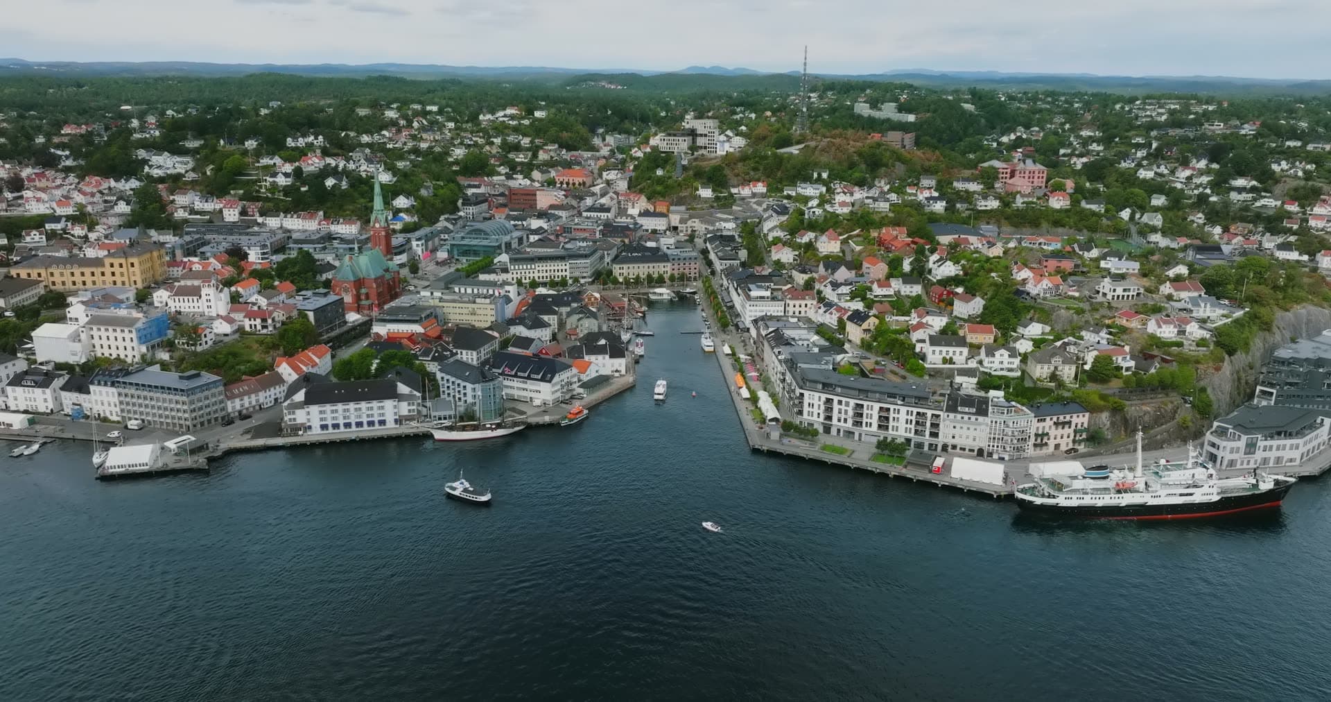 Black-hulled steamship at the harbour quay, Arendal, Norway