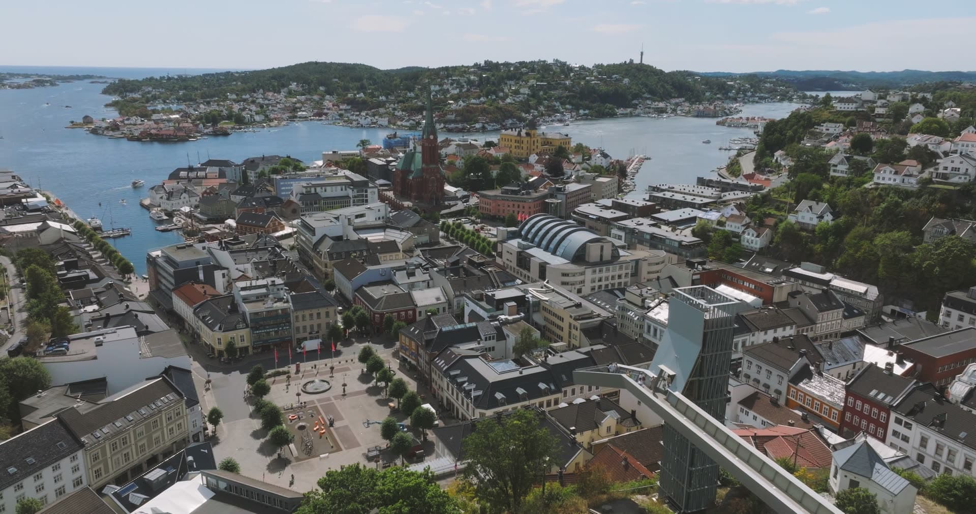 Church spire and town square by the harbour, Arendal, Norway