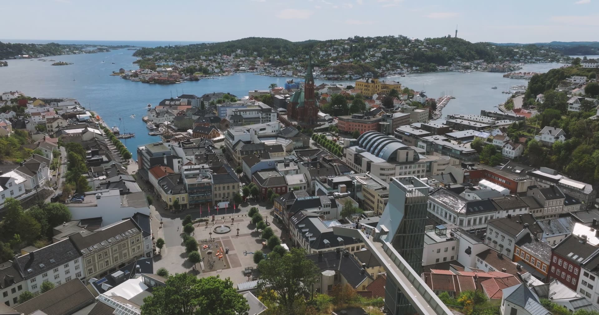 Town square and church spire above the harbour, Arendal, Norway