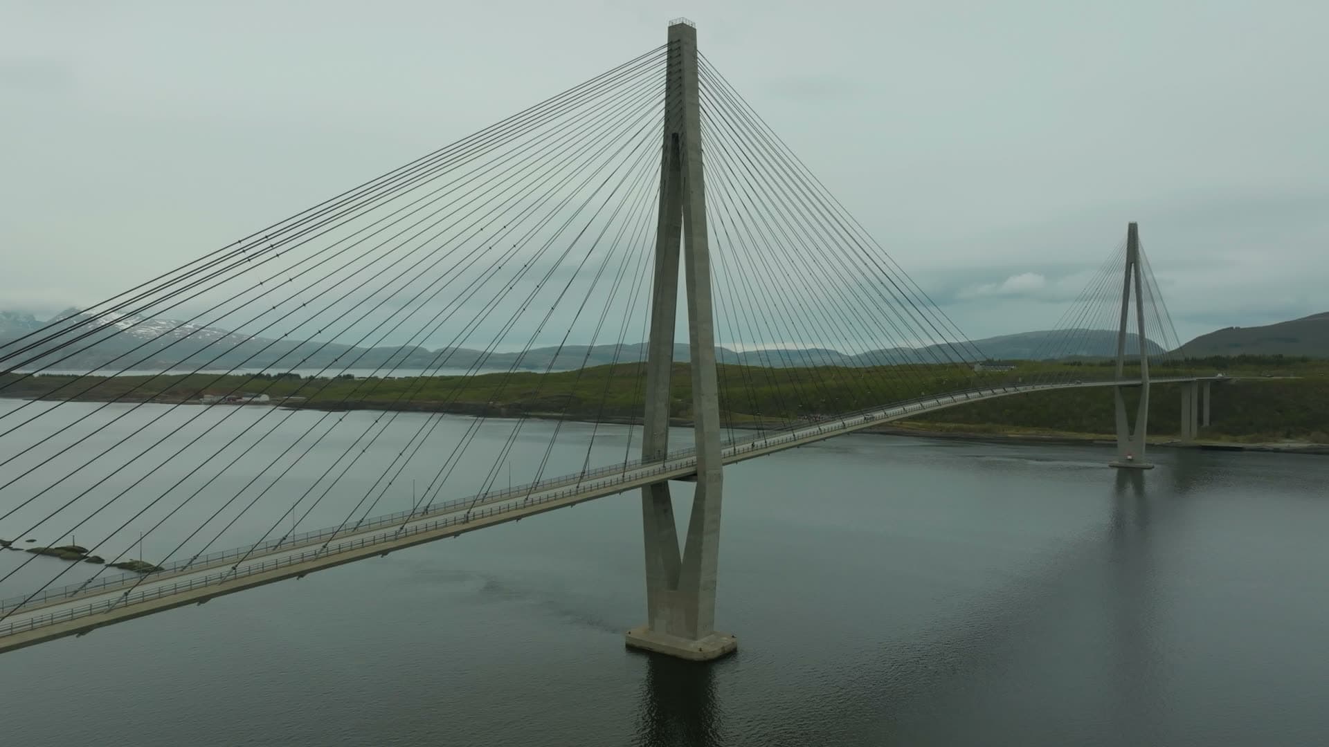 Twin-pylon cable-stayed bridge under grey sky, Helgelandsbrua, Norway