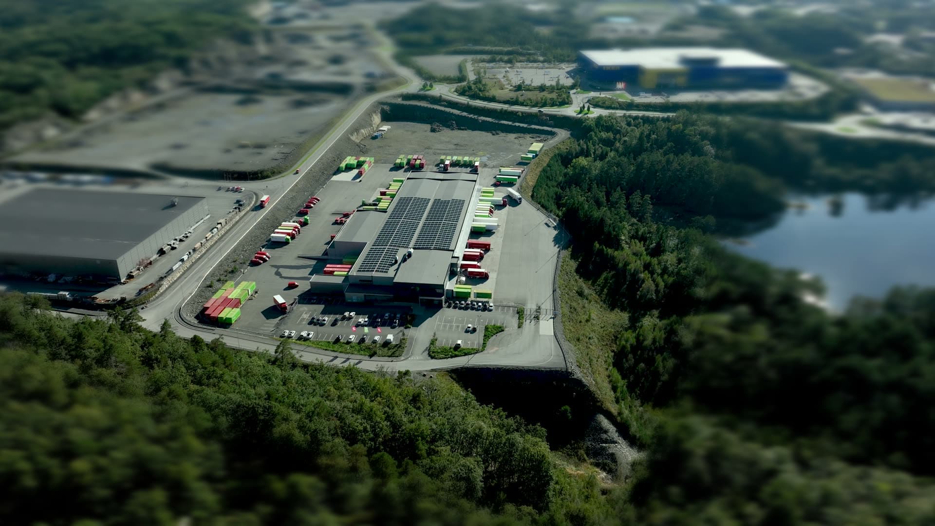 Solar-roofed logistics depot with trailers, Kilandsfoss, Norway