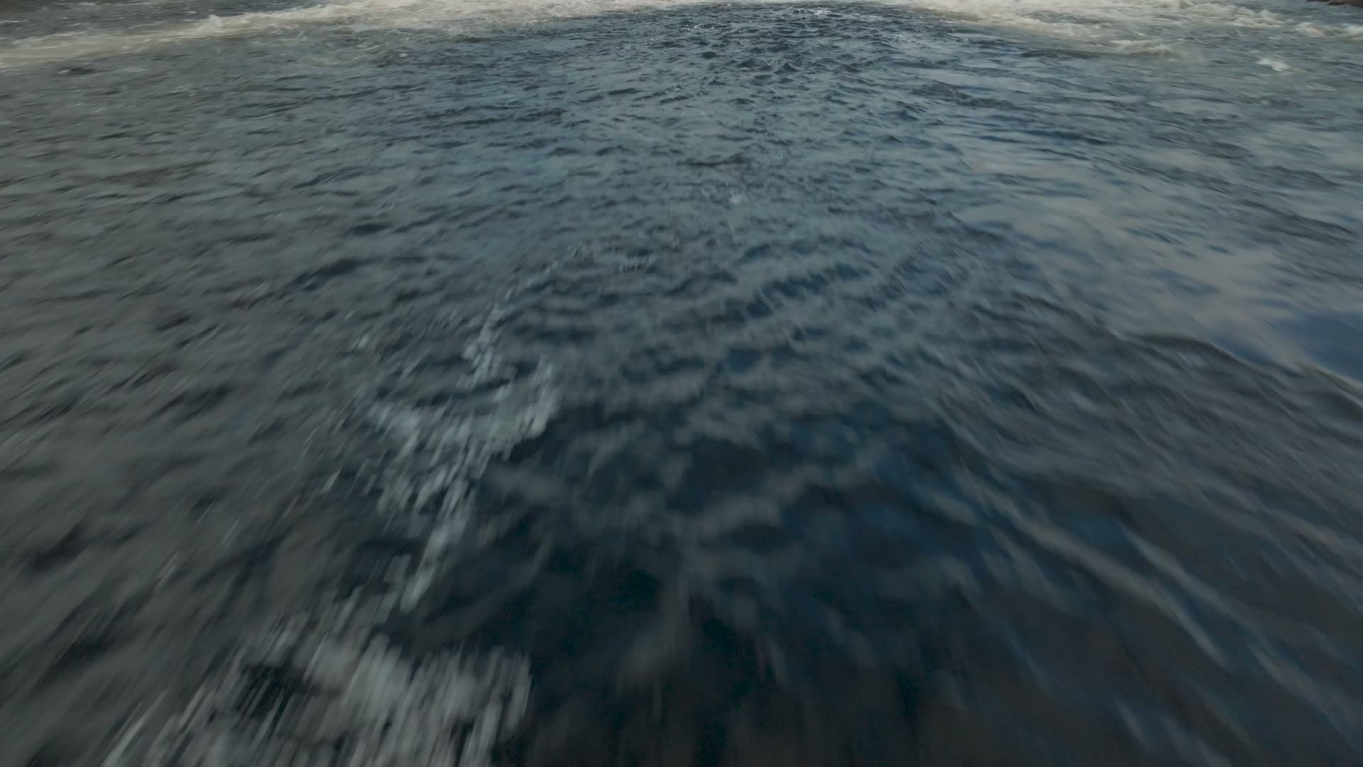 Low flight over river rapids to calm pool, Kilandsfoss, Norway
