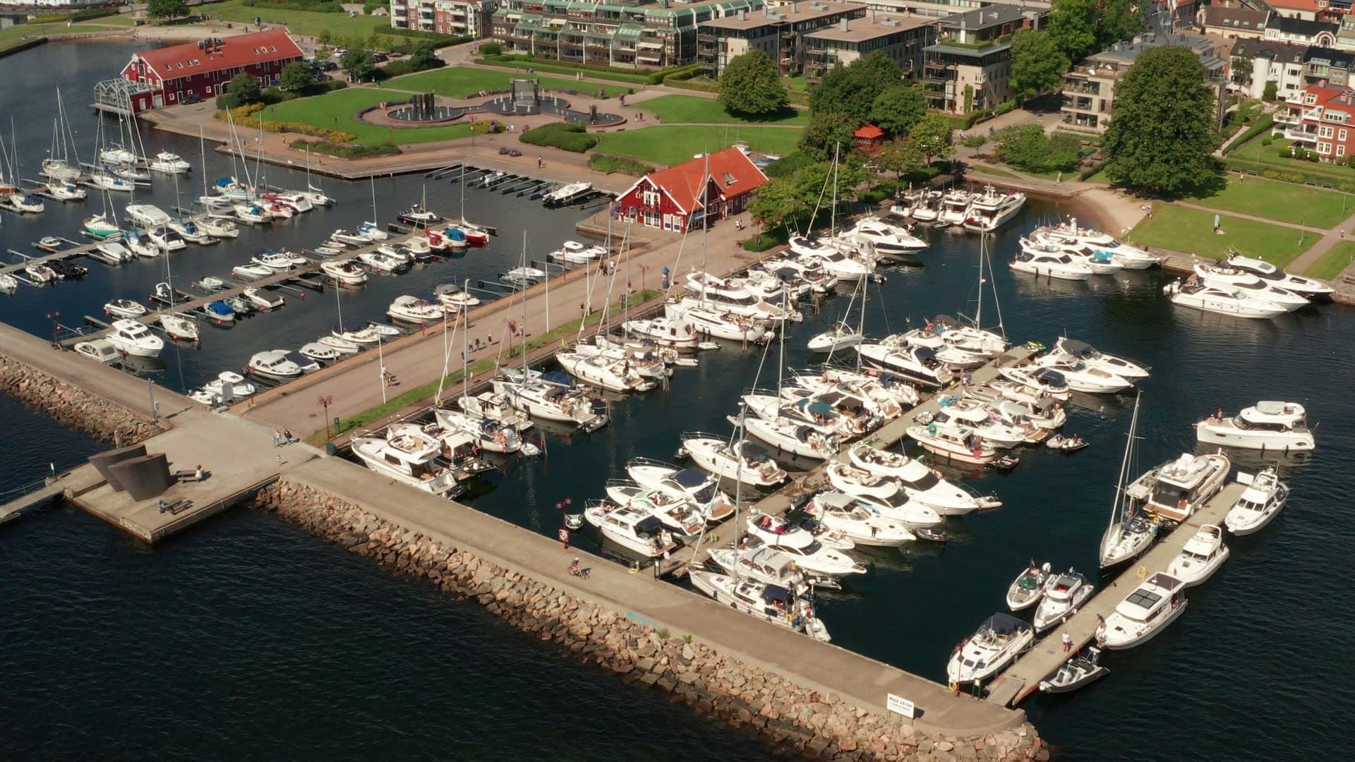 Rock breakwater around packed guest marina, Kristiansand, Norway
