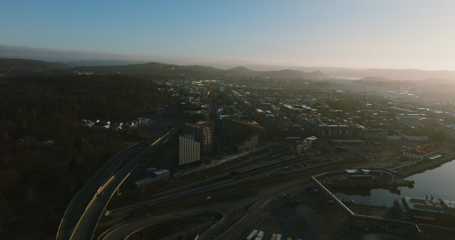 Tower crane by rail yard and port road, Kristiansand, Norway