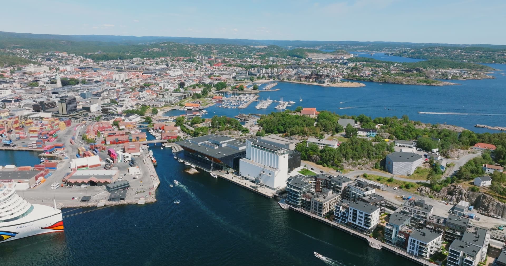 Cruise ship at quay beside grain silo, Kristiansand, Norway