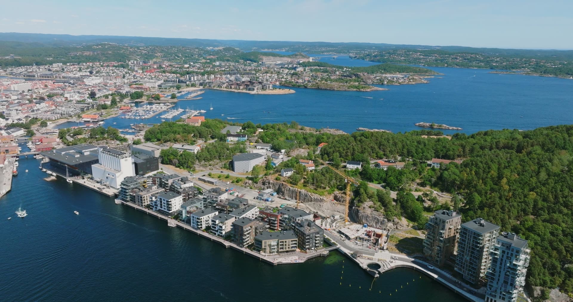 Waterfront blocks and the city across the bay, Kristiansand, Norway