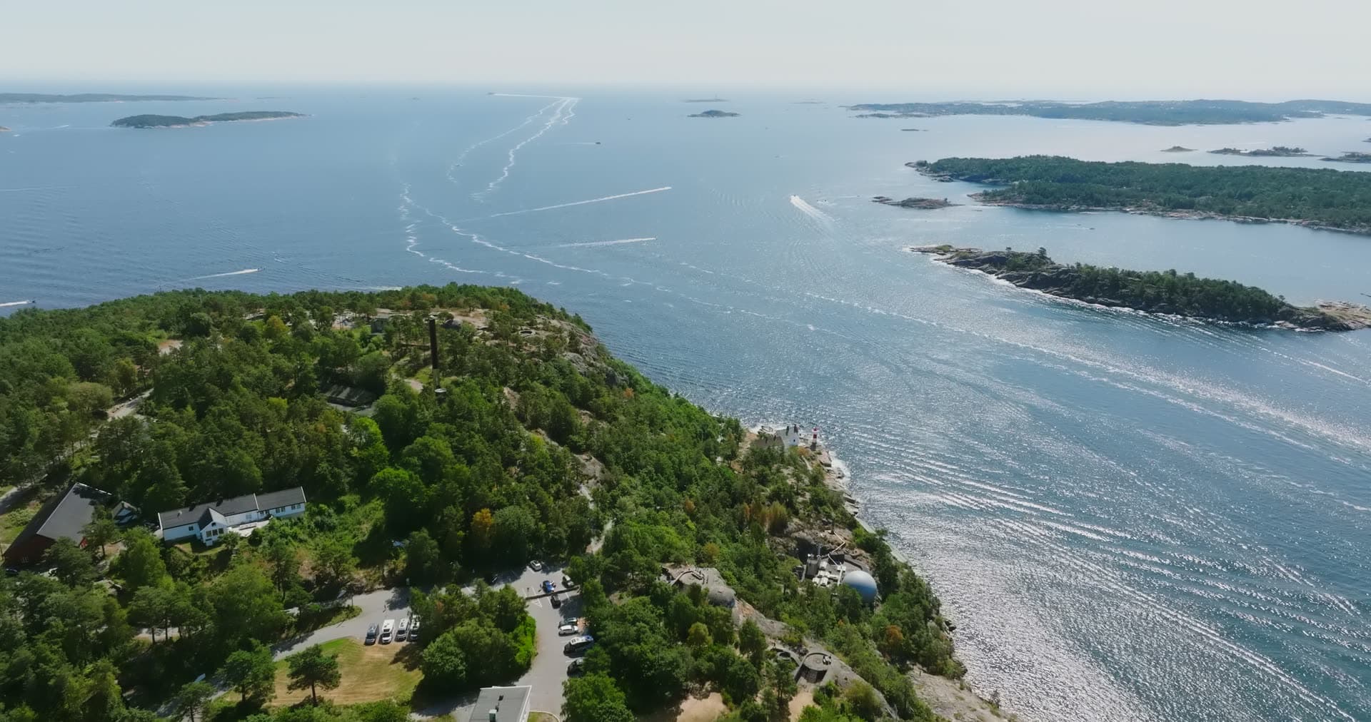 Old chimney on the bare ridge over the sea, Kristiansand, Norway