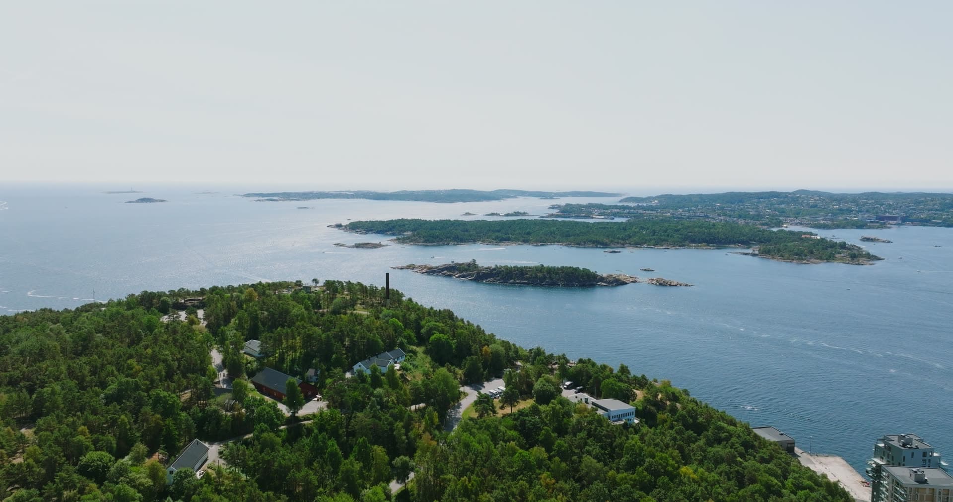 Chimney and pines above the skerry belt, Kristiansand, Norway