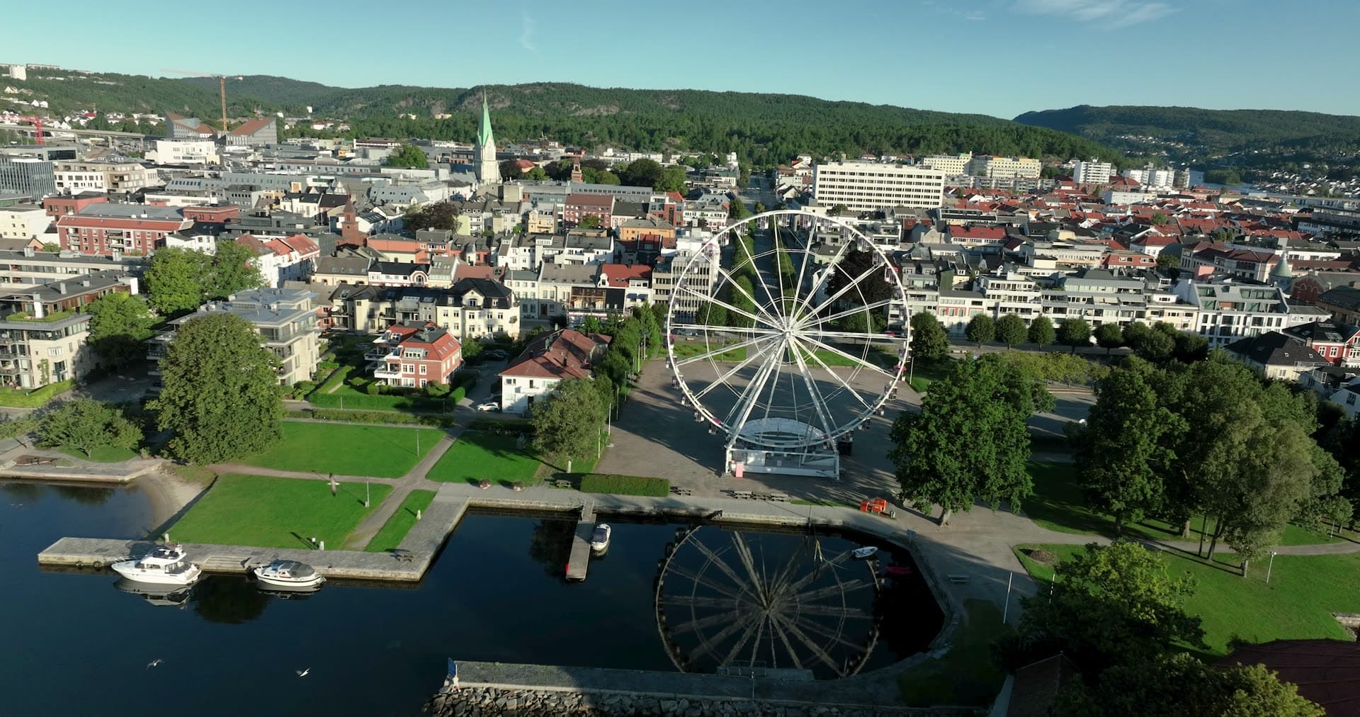 Ferris wheel by marina and round fort, Kristiansand, Norway