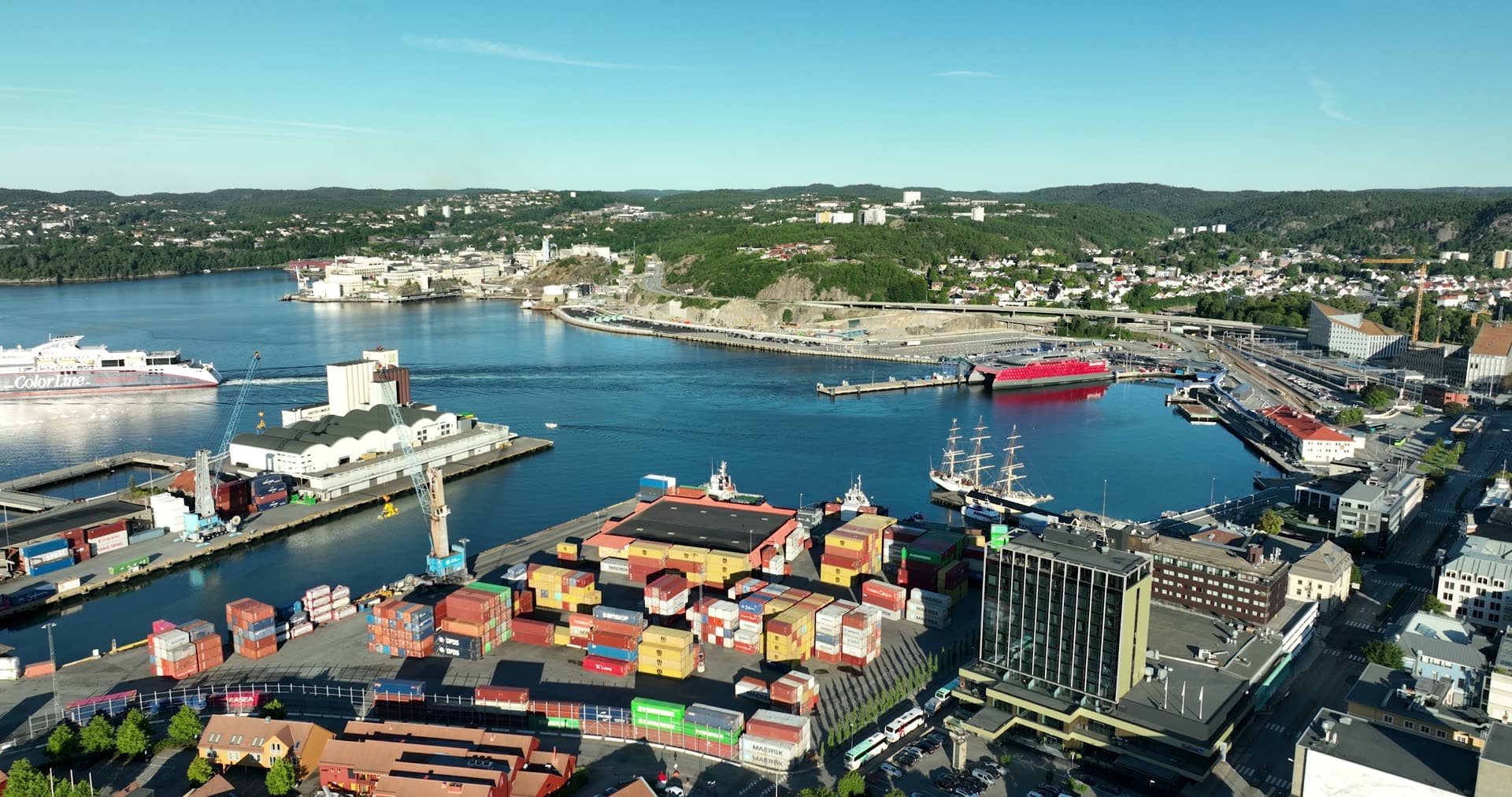 Container port, ferry and tall ship at quay, Kristiansand, Norway