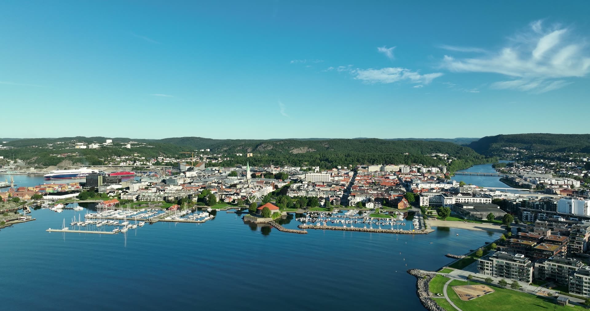 Marinas flanking town centre and church spire, Kristiansand, Norway