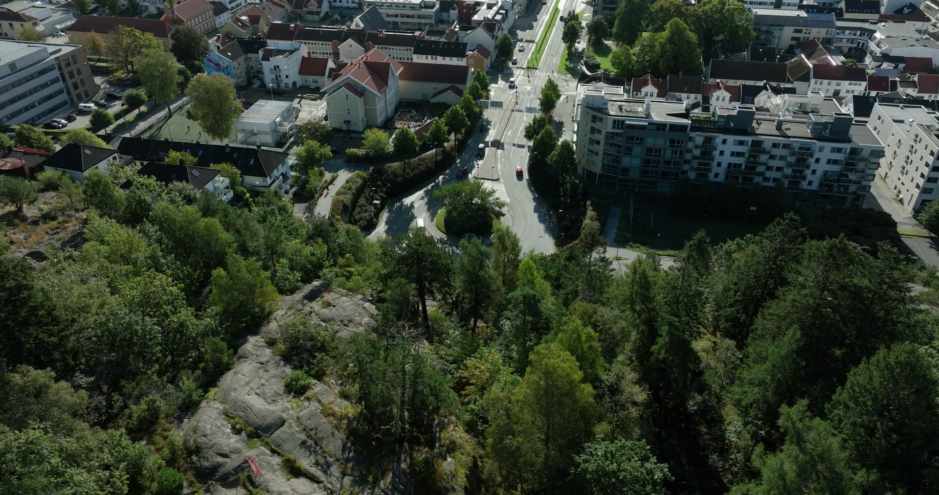 Wooded rock outcrop above town roundabout, Kristiansand, Norway