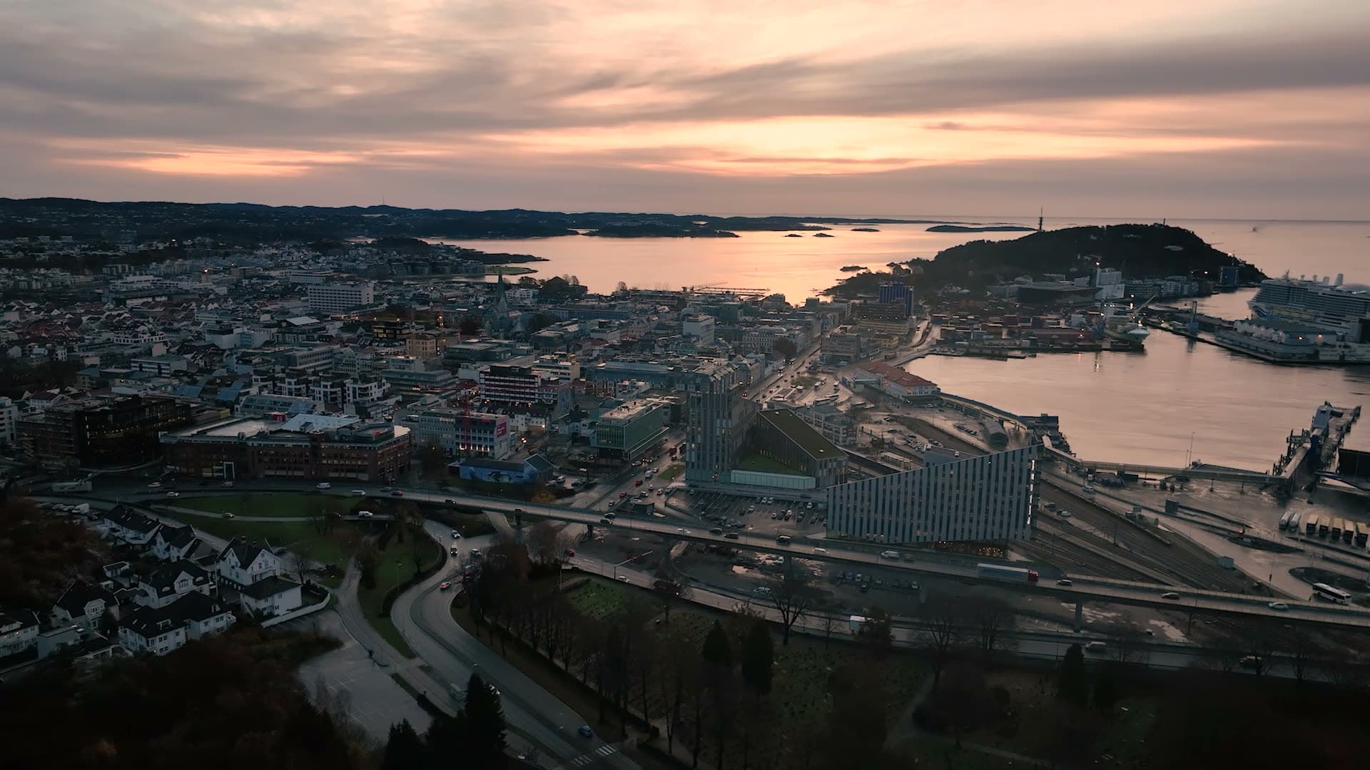 Rail yard and cruise ship port at dusk, Kristiansand, Norway