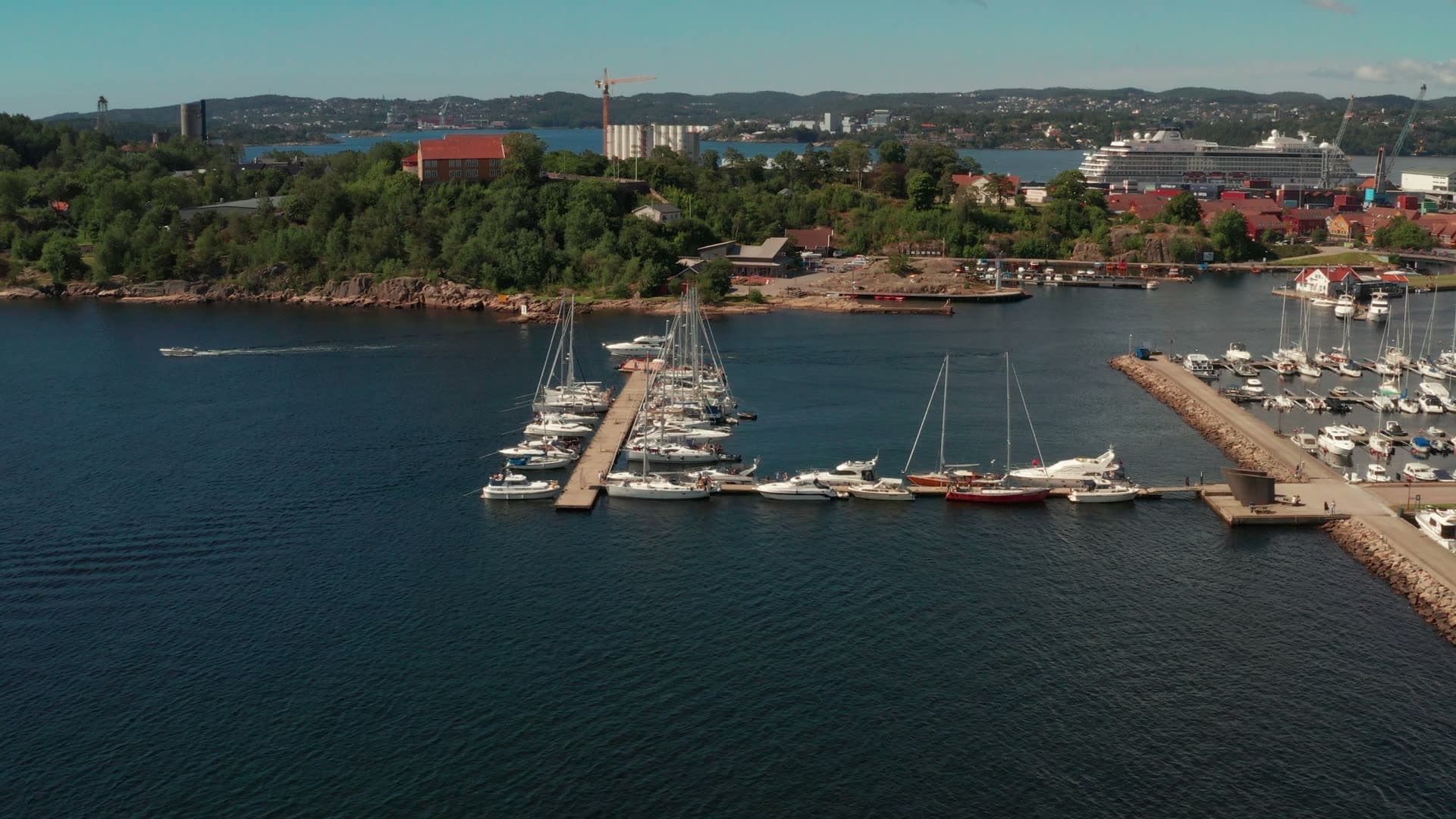 Marina piers with cruise ship behind, Kristiansand, Norway