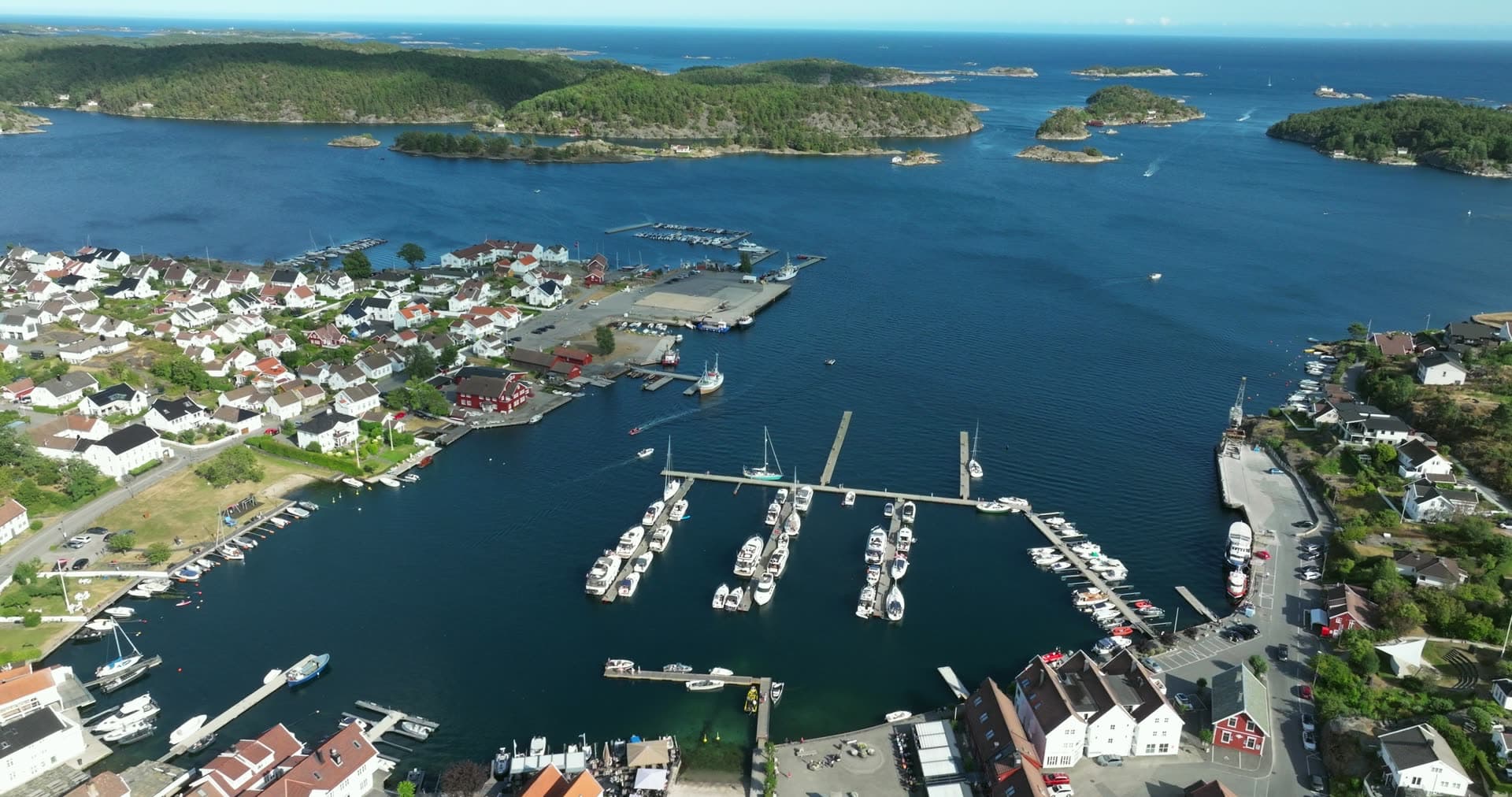 Marina pontoons and white town houses, Lillesand, Norway