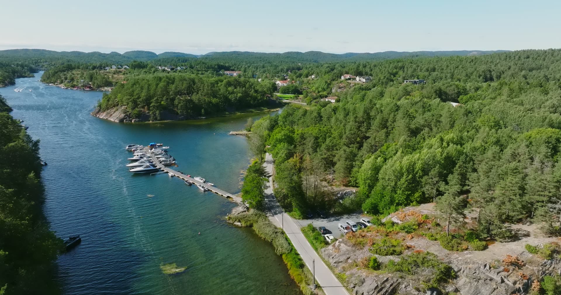 Jetty of moored boats reaching into the inlet, Lillesand, Norway