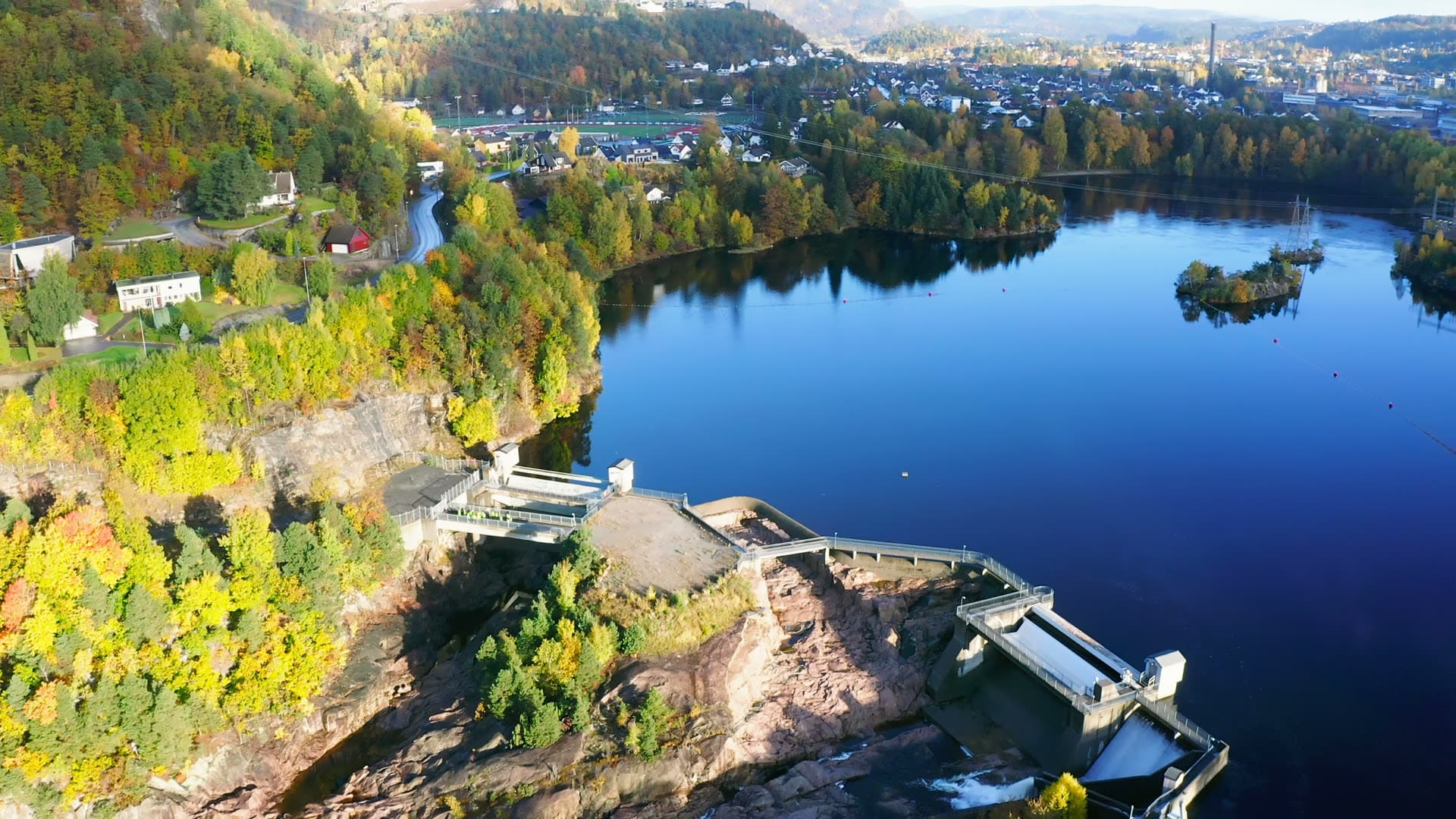 Hydro dam gates on a cliff above a lake, Moseidmoen, Norway