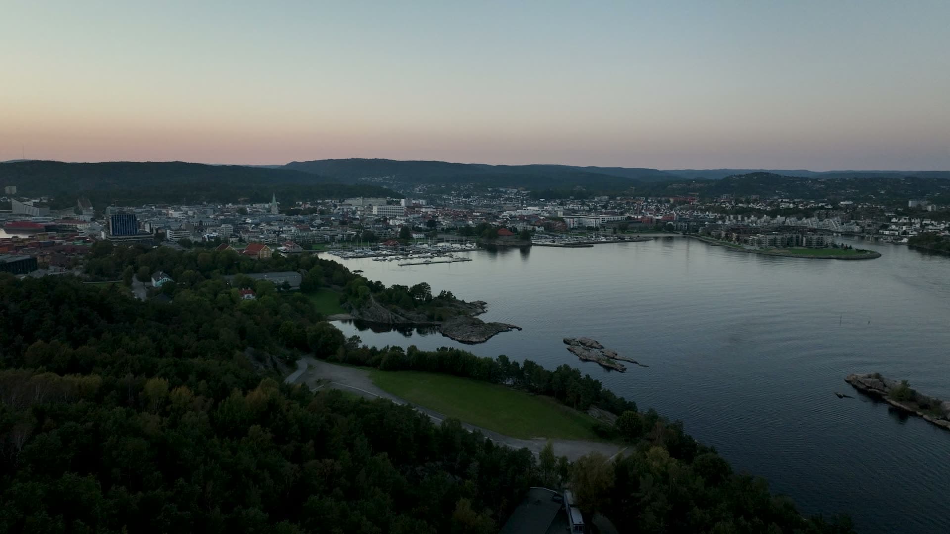 Radio mast, then bay and marina at dusk, Odderøya, Norway