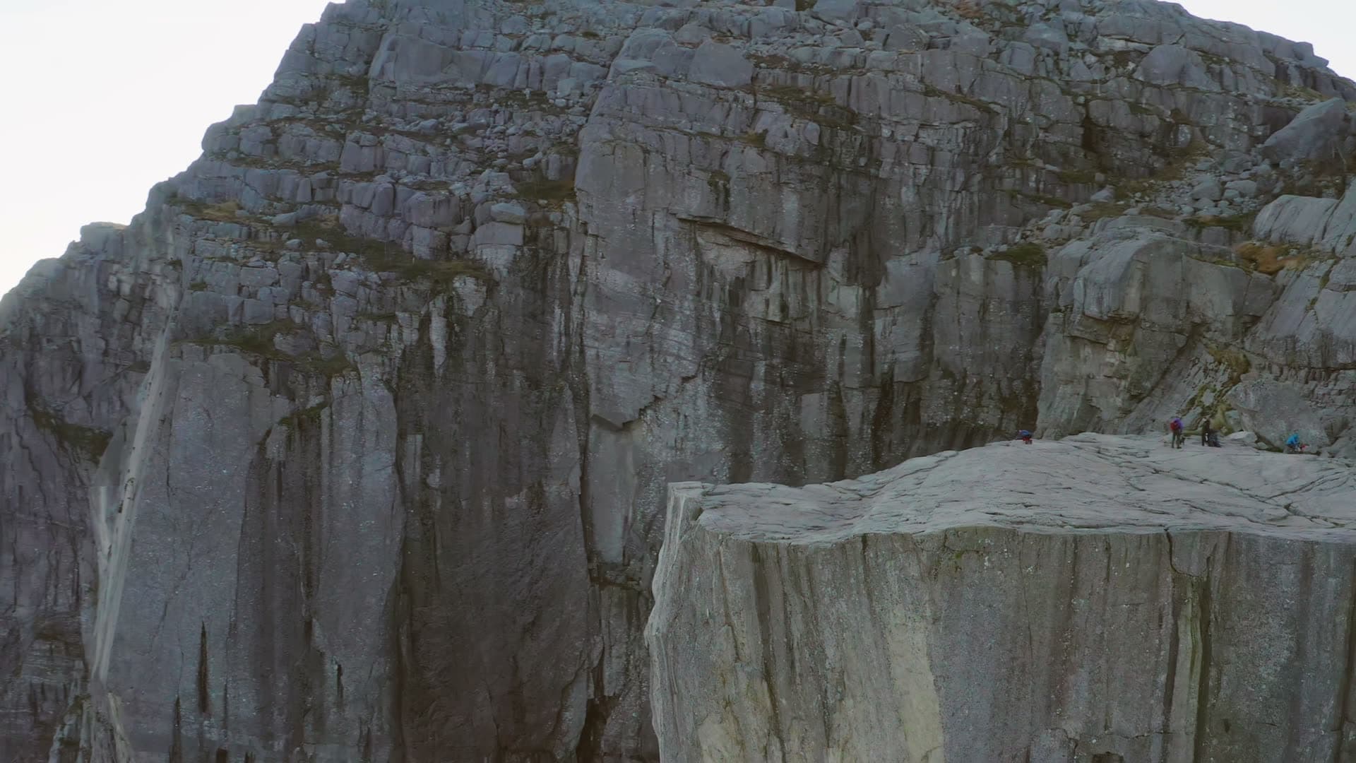 Empty Pulpit Rock plateau in shadow at dawn, Preikestolen, Norway