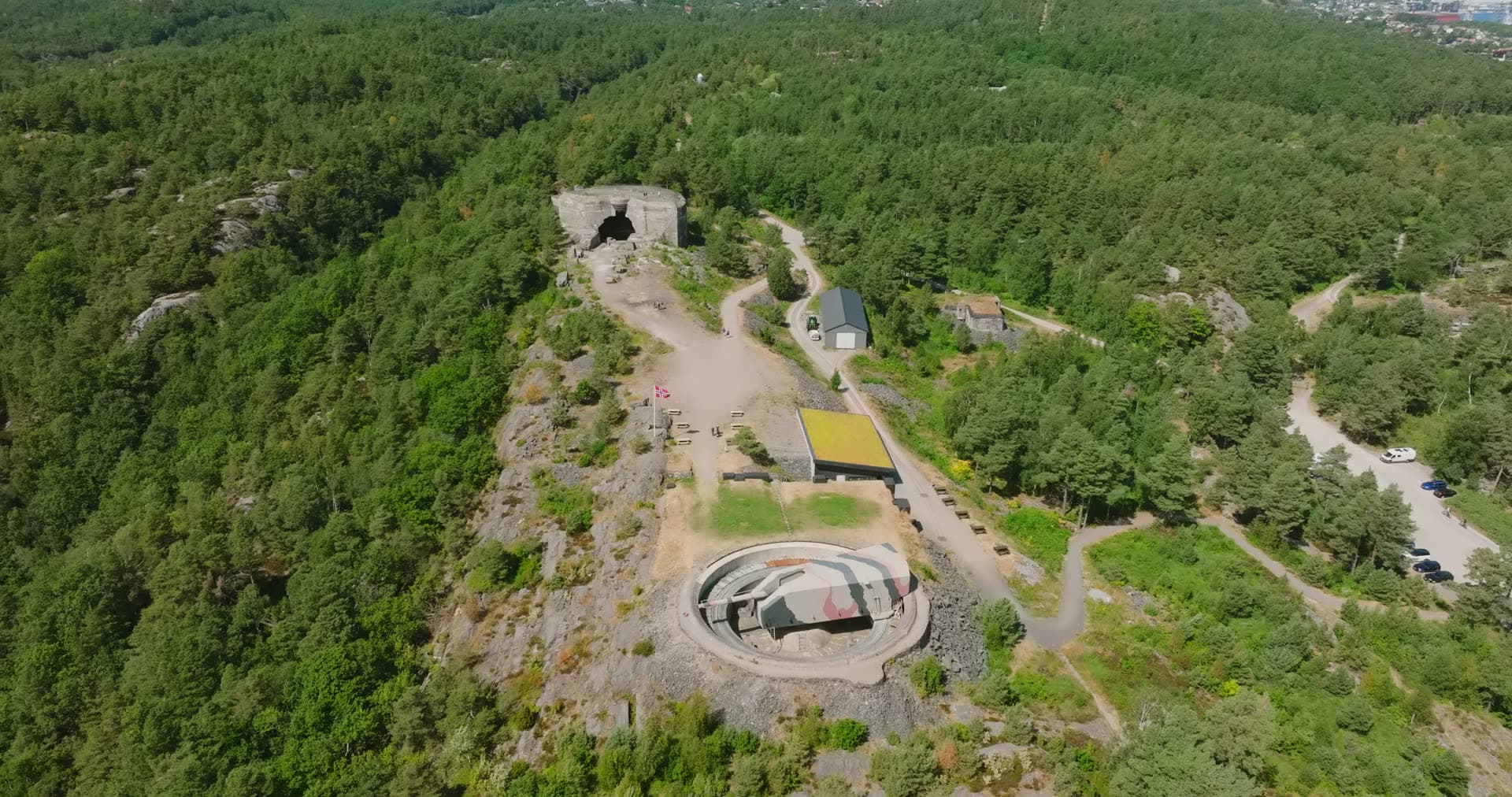 Camouflaged coastal gun in its circular pit, Møvik, Norway