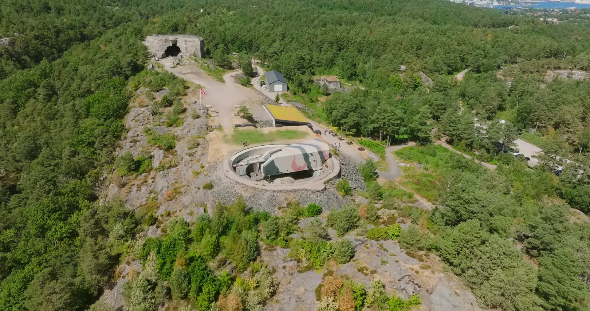 Gun emplacement with the harbour cranes beyond, Møvik, Norway