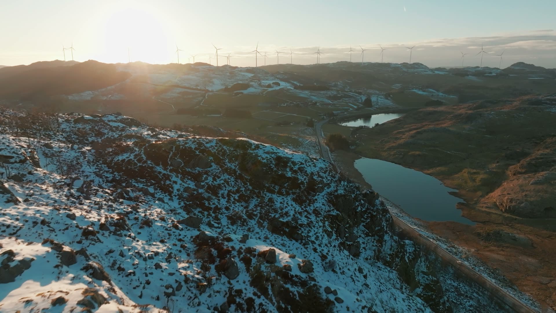 Wind turbine ridge above road and tarns, Skurvenuten, Norway