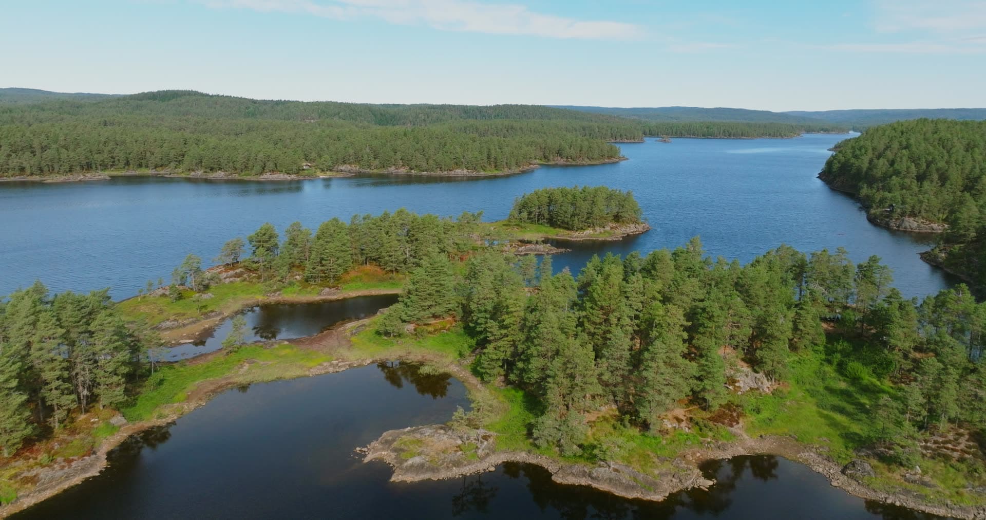 Small pond trapped inside a lake island, Vassbotn, Norway