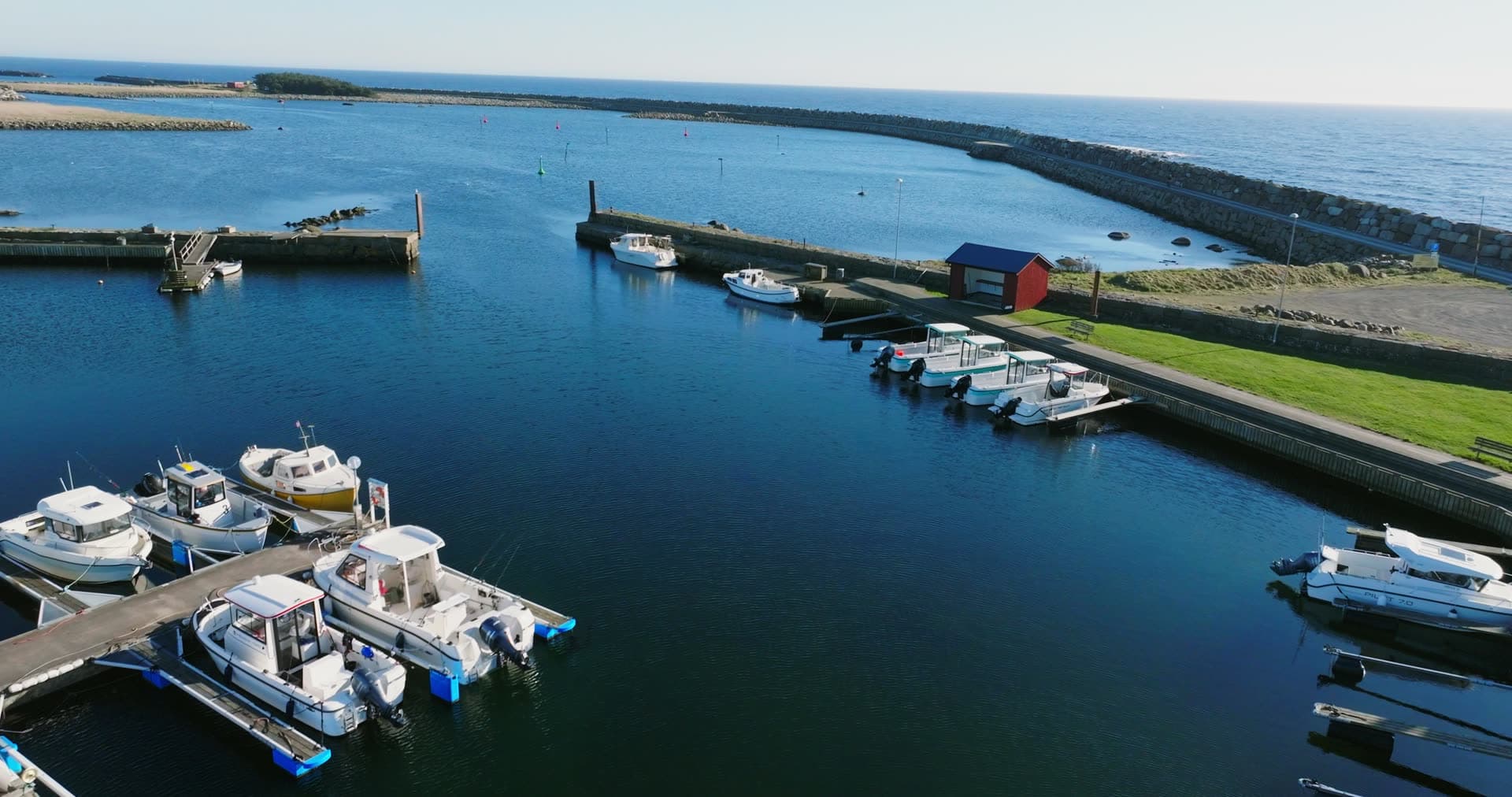 Harbour entrance between stone breakwaters, Vestbygd, Norway
