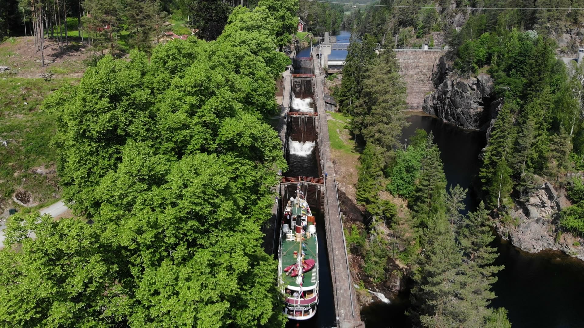 Passenger boat waiting in canal lock stairs, Vrangfoss, Norway